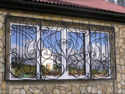 Кованые решетки на окна Киев,  козырёк над входом,  заборы,  перила
